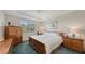 Inviting bedroom featuring a cozy bed, natural light, and tasteful decor at 17026 Loudon Pl, Bradenton, FL 34202