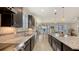 Modern kitchen featuring granite countertops, stainless steel appliances, and plenty of cabinet space at 17026 Loudon Pl, Bradenton, FL 34202