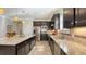 Modern kitchen featuring granite countertops, stainless steel appliances, and ample cabinet space at 17026 Loudon Pl, Bradenton, FL 34202