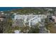 Aerial view of a condo complex with balconies, parking, and beautiful bay views at 1709 N Tamiami Trl # 408, Sarasota, FL 34234