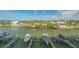 Aerial shot of boat docks, with several boats parked, highlighting waterfront living at 1709 N Tamiami Trl # 408, Sarasota, FL 34234