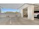 Spacious parking garage in a condo building, with designated parking spots at 1709 N Tamiami Trl # 408, Sarasota, FL 34234