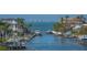 Waterfront with multiple boat slips in front of homes with bay views at 1709 N Tamiami Trl # 408, Sarasota, FL 34234
