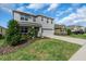 Well-kept two-story home with lovely landscaping and a spacious driveway at 17119 Harvest Moon Way, Bradenton, FL 34211