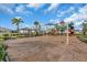 Community playground with swings and slide at 17119 Harvest Moon Way, Bradenton, FL 34211