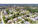 Aerial shot of a residential community showing well-maintained homes and green spaces in a suburban neighborhood at 26137 Dunedin Ct, Punta Gorda, FL 33983