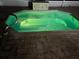 Outdoor hot tub features a lit interior and brick surroundings at 26137 Dunedin Ct, Punta Gorda, FL 33983
