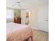 Bedroom with ensuite bathroom and wood flooring at 2824 Silk Oak Dr, Sarasota, FL 34232