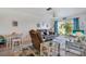 Bright living room with water view, sliding doors to patio, and comfortable seating at 2907 51St W Ave, Bradenton, FL 34205