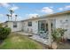 Outdoor patio with a table and chairs set, providing a cozy space for relaxation at 2907 51St W Ave, Bradenton, FL 34205