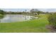 Scenic pond view with lush greenery and peaceful surroundings, perfect for relaxing and enjoying nature at 2907 51St W Ave, Bradenton, FL 34205