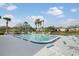 Enjoy a refreshing swim in this sparkling pool surrounded by comfortable lounge chairs and palm trees at 2907 51St W Ave, Bradenton, FL 34205