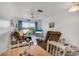 Comfortable living room with view of outdoor seating and the dining area at 2907 51St W Ave, Bradenton, FL 34205