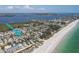 Expansive view of the beach homes near the ocean with white sand at 3007 Avenue E # A, Holmes Beach, FL 34217