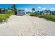 Beachside property with a sandy backyard leading directly to the ocean at 3015 Gulf Of Mexico Dr # 2, Longboat Key, FL 34228