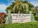 Joan M. Durante Community Park sign with lush landscaping and a community park entrance at 3015 Gulf Of Mexico Dr # 2, Longboat Key, FL 34228