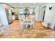 Charming kitchen with stainless steel appliances and a cozy breakfast nook at 3504 Estrada St, Sarasota, FL 34239