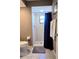 Bathroom featuring a walk-in shower with a gray floor mat and neutral walls at 3630 White Pine Ct # 138, Sarasota, FL 34238