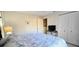 Comfortable bedroom with a queen bed, television and closet at 3630 White Pine Ct # 138, Sarasota, FL 34238