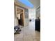 Inviting entryway featuring tile floors and an open view to other rooms of the home at 3630 White Pine Ct # 138, Sarasota, FL 34238