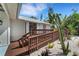 Exterior featuring a ramp and a landscaped front yard with gravel and cacti at 4661 Alligator Dr, Venice, FL 34293