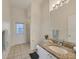 Bathroom showcasing a granite vanity top at 4705 Sweetmeadow Cir, Sarasota, FL 34238