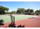 Well-maintained tennis courts on a sunny day at 4705 Sweetmeadow Cir, Sarasota, FL 34238