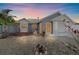 Charming home featuring a well-maintained yard, a mix of textures and neutral paint at 5002 Bunyan St, Sarasota, FL 34232