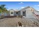 Charming home featuring a well-maintained yard, a mix of textures and neutral paint at 5002 Bunyan St, Sarasota, FL 34232