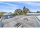 Rooftop patio with open views and multiple storage units, offering an ideal space for outdoor enjoyment at 5002 Bunyan St, Sarasota, FL 34232