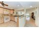Bright kitchen with modern appliances, granite countertops, and an open layout leading to the living room at 503 Spring Lakes Blvd # 503, Bradenton, FL 34210