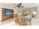 Open concept living area connecting the kitchen, dining, and seating areas with lots of natural light at 503 Spring Lakes Blvd # 503, Bradenton, FL 34210
