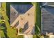 Aerial view of roof of house showcasing detailed landscaping and an adjacent property at 5814 117Th E Ter, Parrish, FL 34219