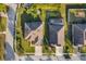 Aerial view of houses with screened in patios and well-maintained lawns in a neighborhood at 5814 117Th E Ter, Parrish, FL 34219