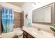 Bathroom with shower-tub, single vanity, and neutral toned walls for a clean and functional space at 5814 117Th E Ter, Parrish, FL 34219