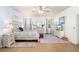 Expansive bedroom with furniture, light-colored furniture, and a soft, purple accent rug at 5814 117Th E Ter, Parrish, FL 34219