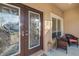 A welcoming front entrance with decorative glass doors and a cozy seating area at 5814 117Th E Ter, Parrish, FL 34219