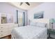 Comfortable main bedroom with a queen-sized bed, dresser, and a soothing color palette, creating a relaxing ambiance at 5814 117Th E Ter, Parrish, FL 34219