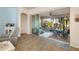 Screened in patio features a dining table with chairs, outdoor furniture, and views of the backyard at 5814 117Th E Ter, Parrish, FL 34219