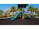 Community playground featuring slides, climbing structures, and lush green space, perfect for Gathering fun at 5814 117Th E Ter, Parrish, FL 34219