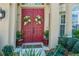 Double doors with foliage in front and on doors at 5911 Laurel Creek Trl, Ellenton, FL 34222