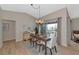 Elegant dining room with sliding glass doors to the lanai at 617 Estuary Dr # 617, Bradenton, FL 34209
