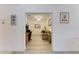 Open doorway leads to a well-lit office and living room at 6326 Grand Oak Cir # 203, Bradenton, FL 34203