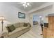 Comfortable office with a sofa, desk, and open access to the living area, creating a versatile workspace at 6326 Grand Oak Cir # 203, Bradenton, FL 34203
