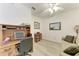 Bright home office with desk, seating, and natural light at 6326 Grand Oak Cir # 203, Bradenton, FL 34203