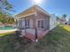 View of screened-in porch highlighting its spaciousness, with a glimpse of the pool at 6704 35Th W Ave, Bradenton, FL 34209