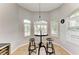 Bright breakfast nook featuring plantation shutters and a cozy dining setup for casual meals at 7305 Birds Eye Ter, Bradenton, FL 34203