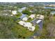 Picturesque community with well-kept lawns, tree-lined streets, and various residences nestled along a serene waterway at 801 Spring Lakes Blvd # 801, Bradenton, FL 34210
