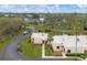Charming one-story home boasting a well-maintained lawn, palm trees, and access to a serene lake view at 801 Spring Lakes Blvd # 801, Bradenton, FL 34210