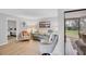 Inviting living room with comfortable seating, wood-look floors, and a bright, airy feel at 801 Spring Lakes Blvd # 801, Bradenton, FL 34210